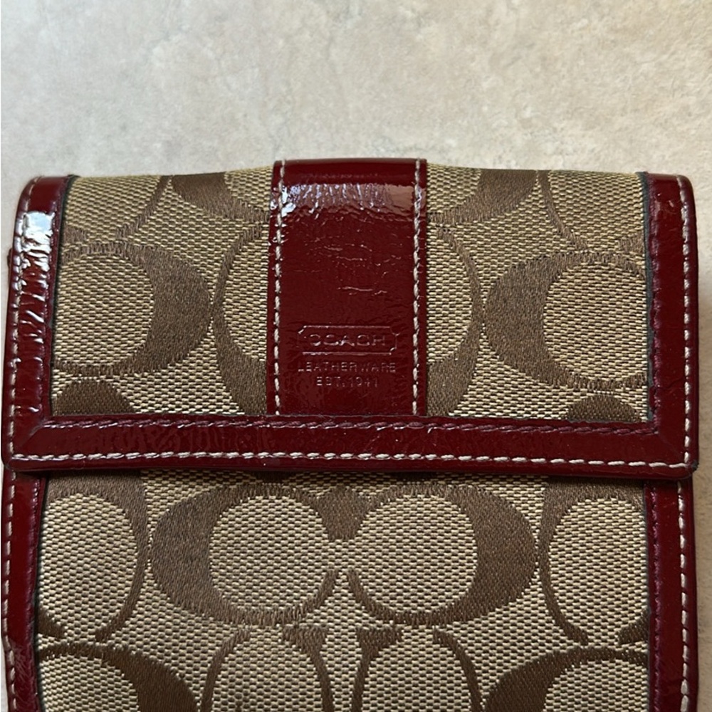 Coach signature jacquard wallet with burgundy patent leather trim